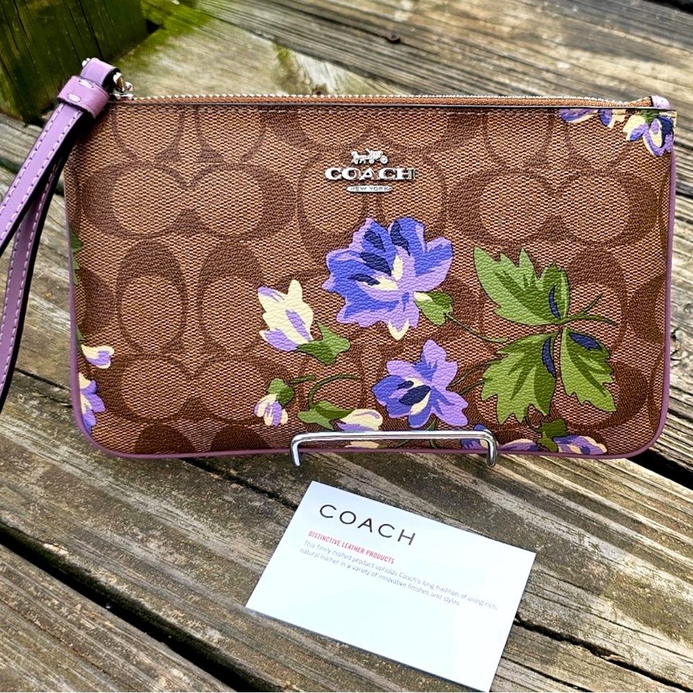 NWT Purple flowered Coach monogram wristlet